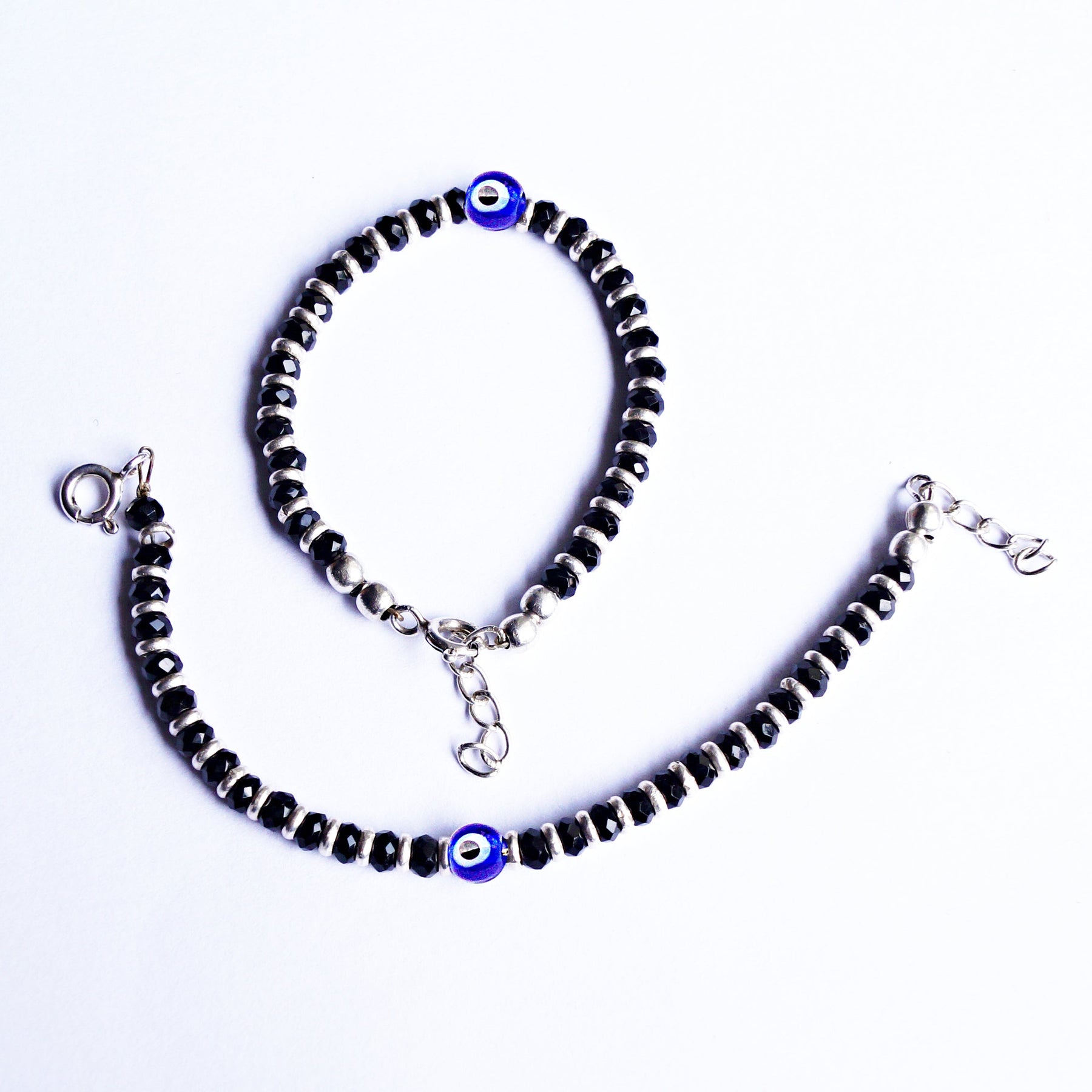 Buy VIRAASI Men Black & Blue Evil Eye Bracelet Online