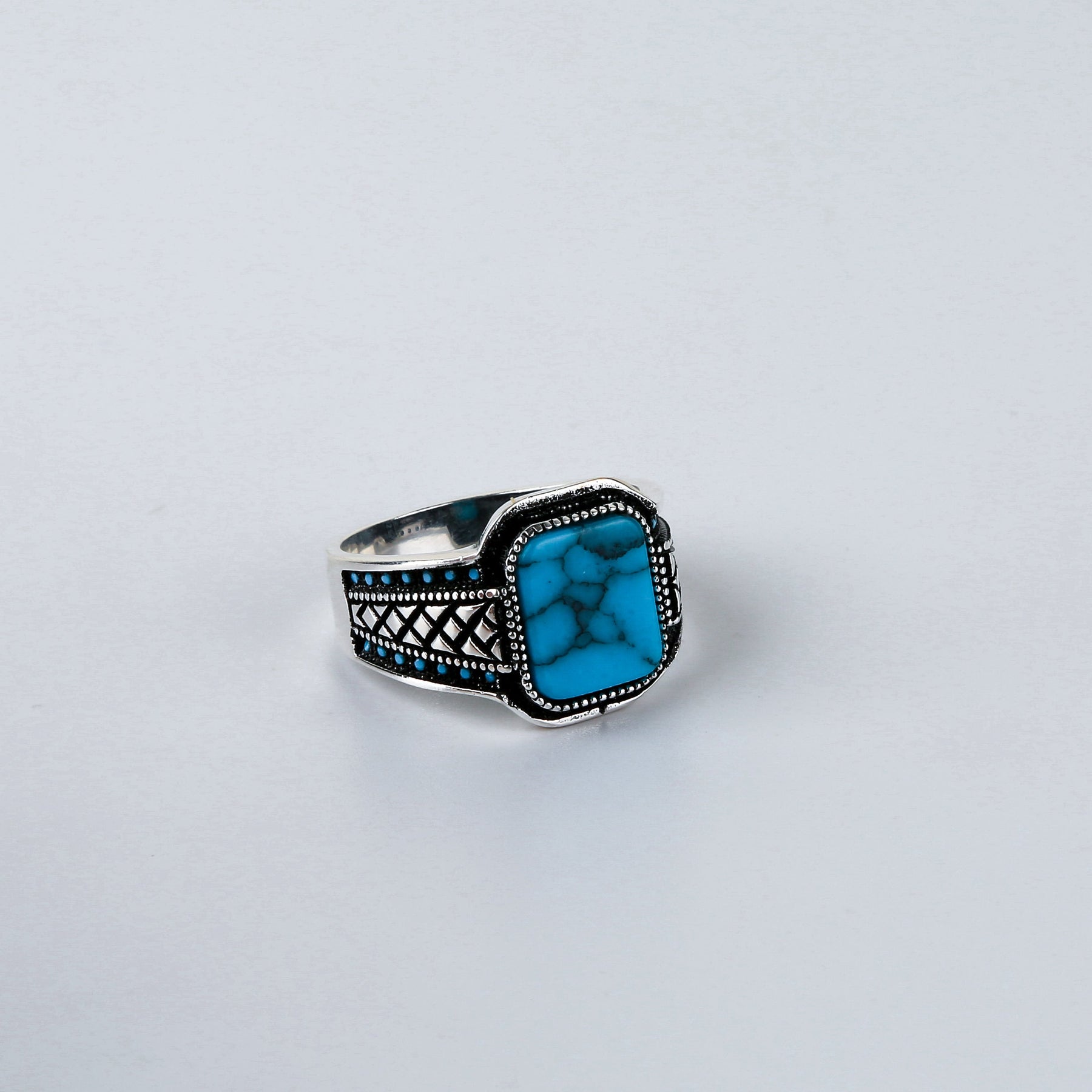 The Soft-edge Rectangle Turquoise Criss-cross Accent Ring