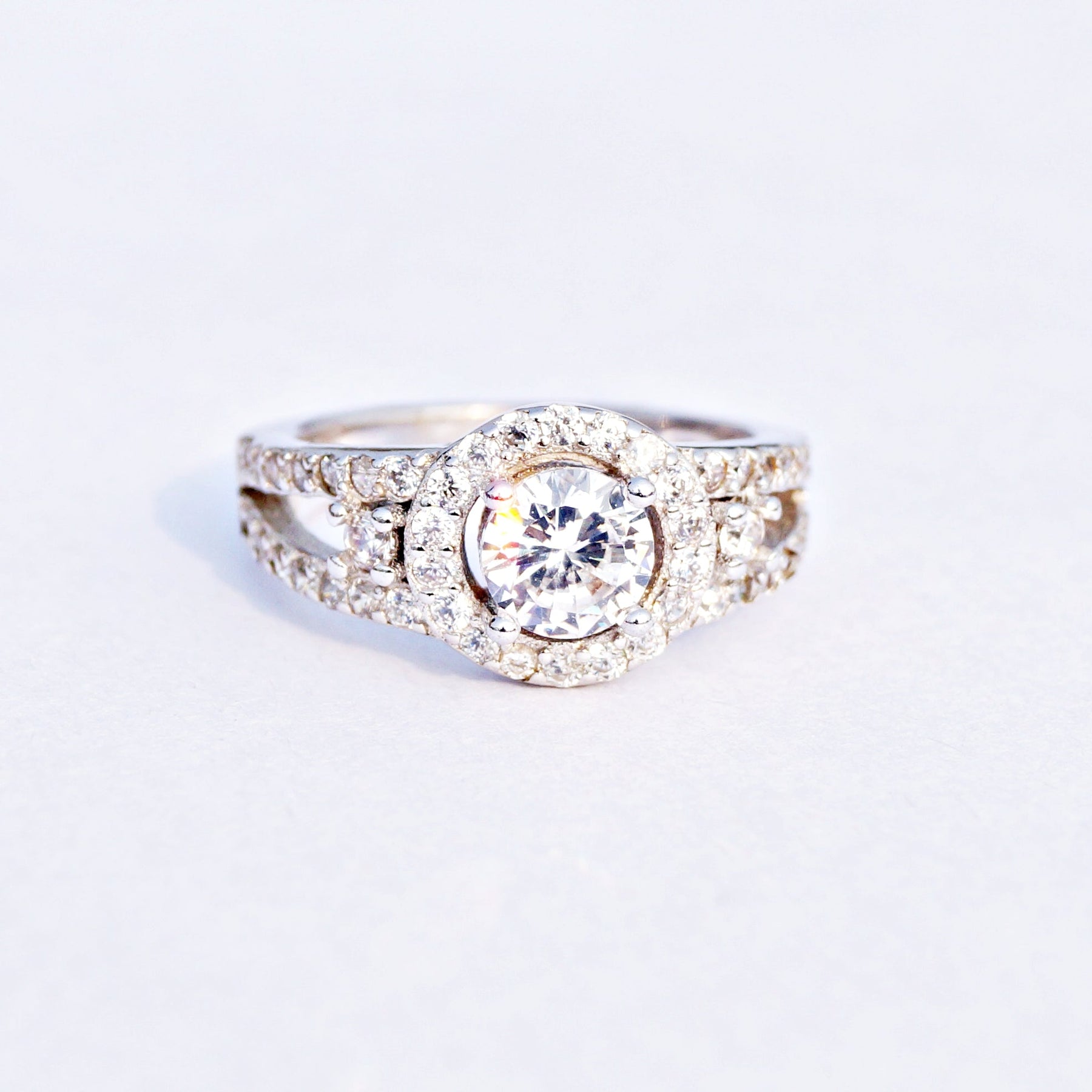 The Halo Solitaire with Double Accent Cz Ring