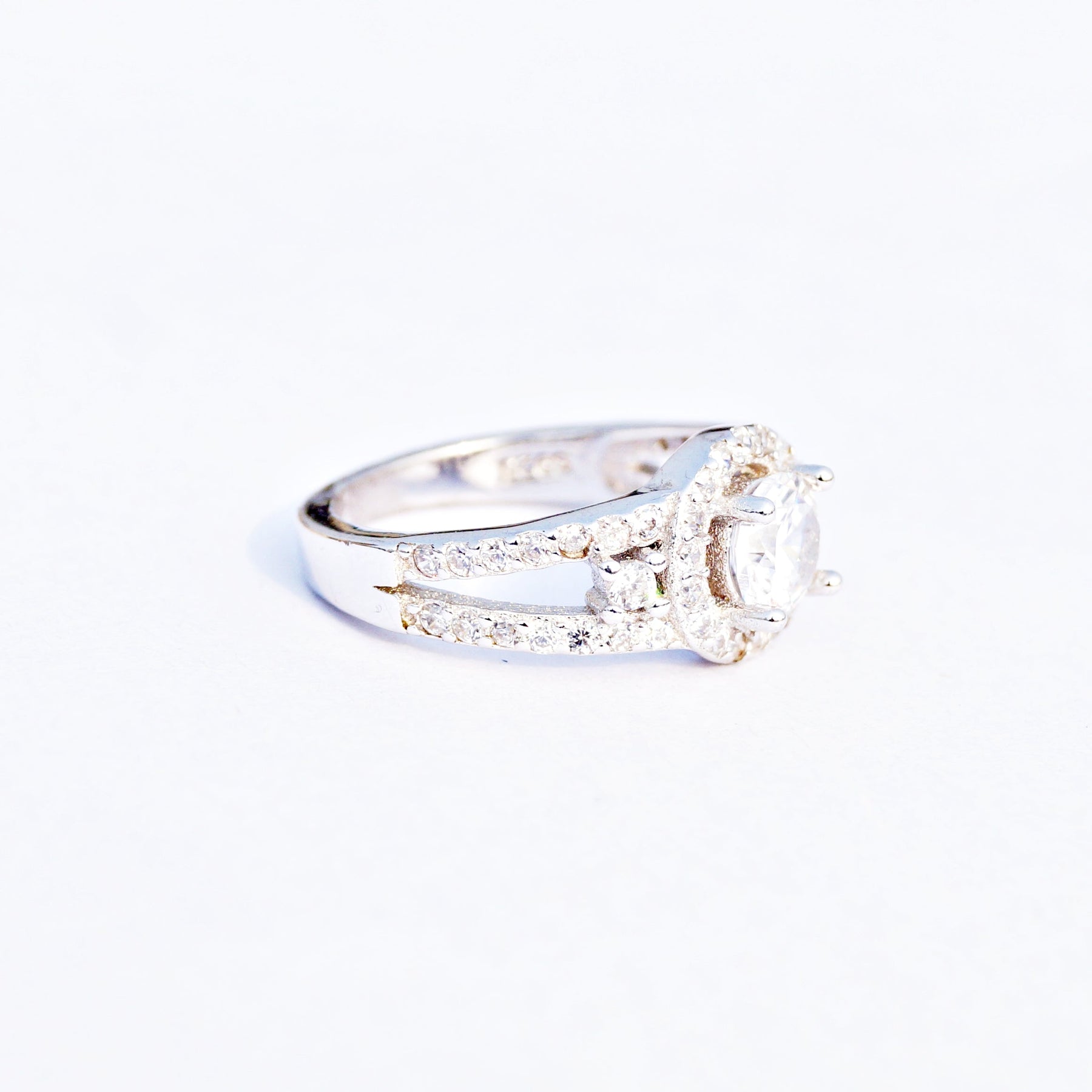 The Halo Solitaire with Double Accent Cz Ring