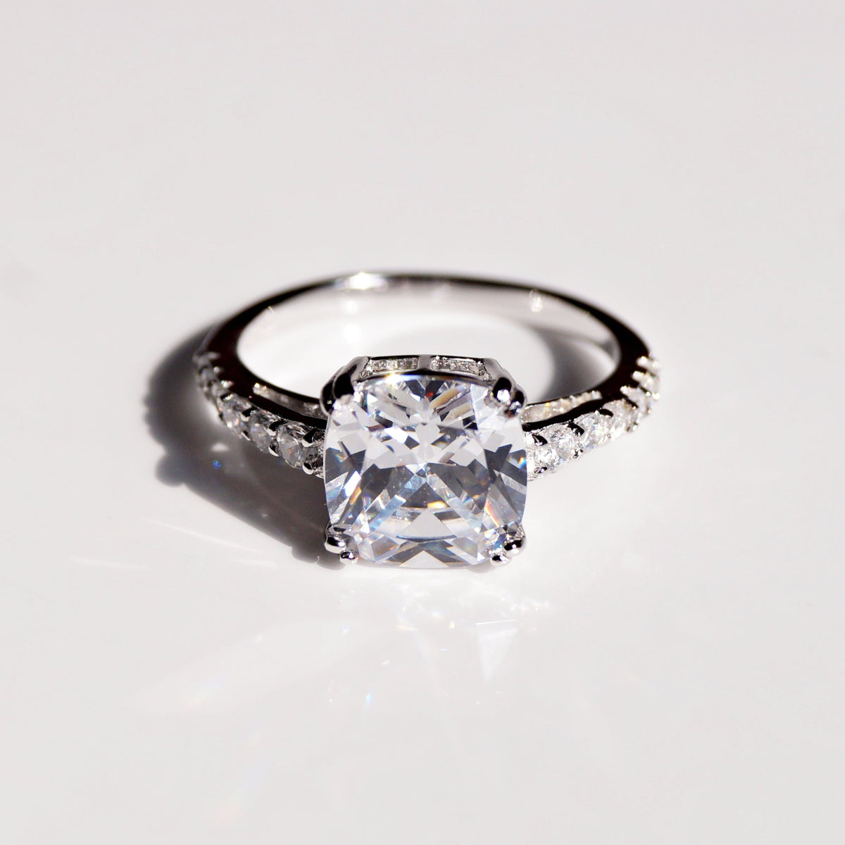 Princess Cut Solitaire Ring with Accent Diamonds