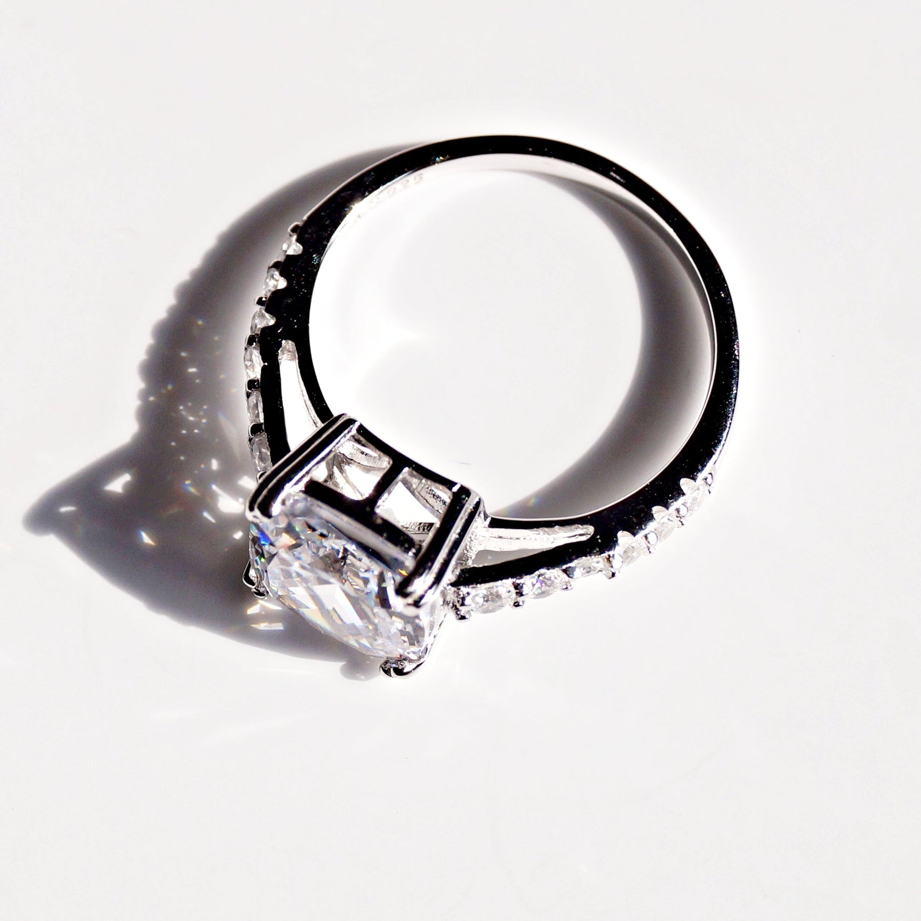 Princess Cut Solitaire Ring with Accent Diamonds
